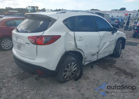2014 Mazda Cx-5 Touring from USA, damaged, VIN JM3KE2CY7E0409232